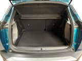 a trunk of a car with the back door open