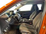 the interior of a car with the door open showing the driver ' s seat
