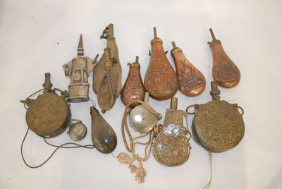 a lot of antique items that are on the table