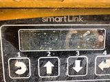a close up of a smart link button on a machine