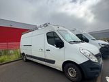 a white van that is parked in a parking lot