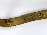a metal object that has been made to look like an anchor