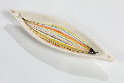 a white plate with a colorful striped design on it