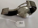 a watch that is sitting on a white table