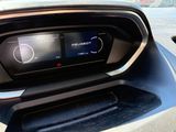 a car dashboard with a digital display on it