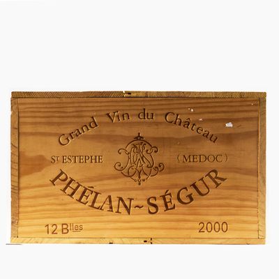 a wooden box with a sign on it that says grand vin de chateau