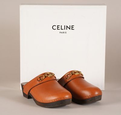 mules en cuir Celine avec chaîne dorée