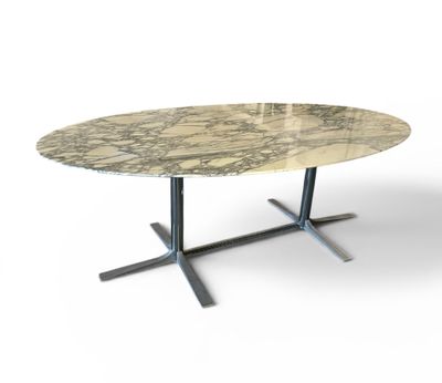 an image of a round marble table with a metal base