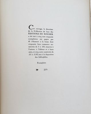 an open book with a black and white picture of a cat