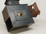 an old camera that is sitting on a table