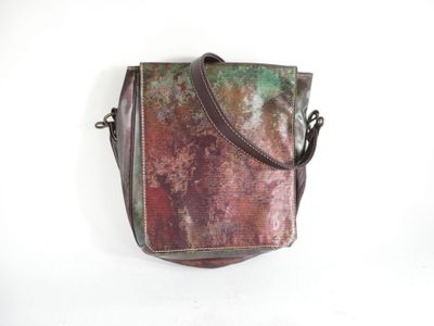 an image of a purse hanging on a wall