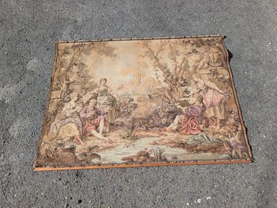 une vieille tapisserie sur laquelle est représentée une scène biblique