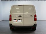 a white van that is parked in a garage