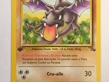 a close up of a pokemon card on a white surface