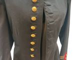a black jacket with gold buttons and red trims on a mannequin mannequin mannequin mannequin mannequin mannequin manne