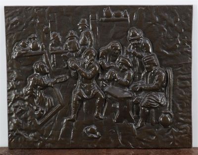 une photo d'une plaque en bronze représentant un groupe de soldats