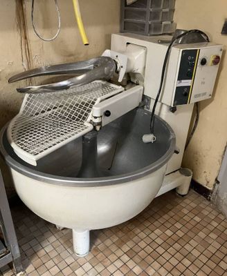 an image of a kitchen with a large bowl of food