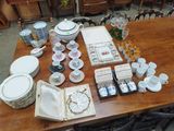 a table with a lot of plates and bowls on it
