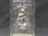 a glass mug with a beer on it on a table