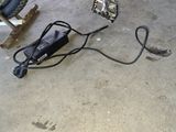 a power cord that is connected to a motorbike