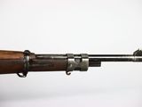 a close up of a rifle on a white background