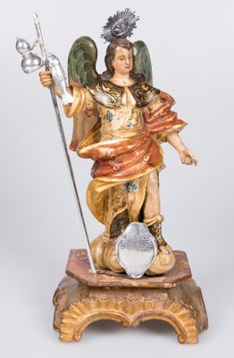 une image représentant une statue d'un ange tenant un bâton