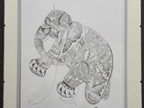 dessin d'un éléphant dans un cadre accroché au mur