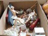 a box full of assorted items sitting on the floor
