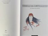 an open book with a drawing of a man in a red hat
