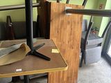 a table with a clock on it and a knife on it