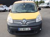 a yellow and black van parked in a parking lot