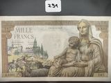 une image représentant une femme et un enfant sur un billet de banque