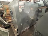 a machine that is sitting inside of a building