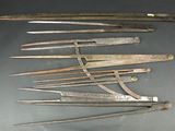 a lot of old tools that are laying on a table