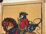 un tableau représentant un homme à cheval accroché au mur