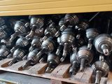 many different types of metal parts on a pallet