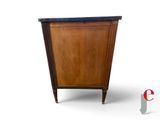 an image of a wooden cabinet with a marble top