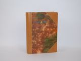 an image of a book with a brown cover on a white surface