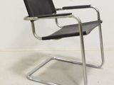 an image of a chair with a black leather seat