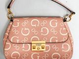 Sacs à main Guess Sacs à main Guess Sac à main rose avec finitions dorées