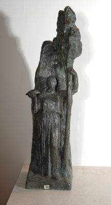 statue of a woman holding a child in her arms