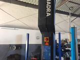 an image of a car being worked on in a garage