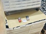 a stack of boxes with a computer on top of it