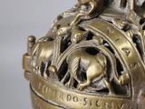 a statue of a man and a woman riding on a horse