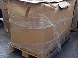 a large box sitting on top of a pallet in a warehouse