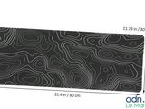 a close up of a black and white photo of a mouse mat