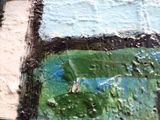 a close up of a piece of art that is on a table