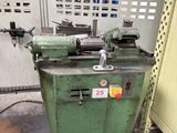 a machine that is sitting on the floor next to a wall