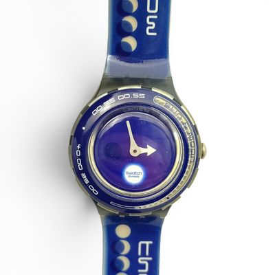an image of a close up of a wrist watch on a white surface