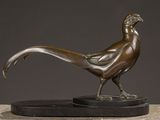 bronze sculpture of a pheasant on a marble base